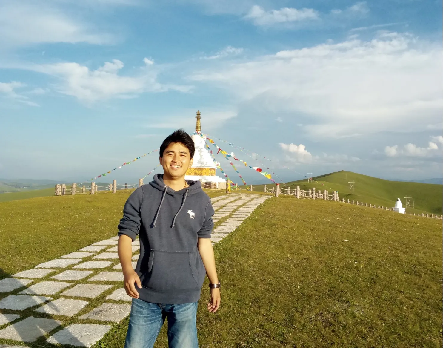 Man in front of stupa